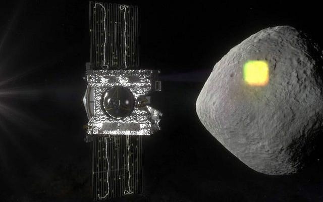 This artist's rendering made available by NASA in July 2016 shows the mapping of the near-Earth asteroid Bennu by the OSIRIS-REx spacecraft. (NASA/Goddard/University of Arizona via AP) This artist's rendering made available by NASA in July 2016 shows the mapping of the near-Earth asteroid Bennu by the OSIRIS-REx spacecraft. (NASA/Goddard/University of Arizona via AP)