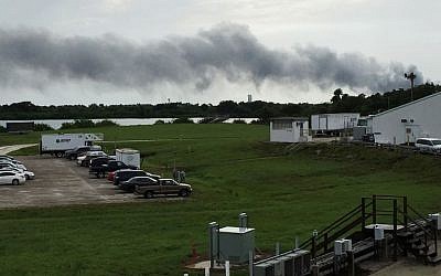 Smoke rises from a SpaceX launch site  after an explosion during a test of an unmanned rocket at Cape Canaveral, Florida, September 1, 2016. (AP/Marcia Dunn)