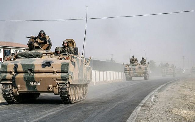 Turkish army tanks and armored personnel carriers move toward the Syrian border, in Karkamis, Turkey, August 25, 2016 (AP Photo/Halit Onur Sandal, File) Turkish army tanks and armored personnel carriers move toward the Syrian border, in Karkamis, Turkey, August 25, 2016 (AP Photo/Halit Onur Sandal, File)
