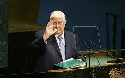 Syria's Foreign Minister Walid Moallem waves after addressing the 71st session of the United Nations General Assembly at UN headquarters, Saturday, Sept. 24, 2016. (AP Photo/Jason DeCrow)