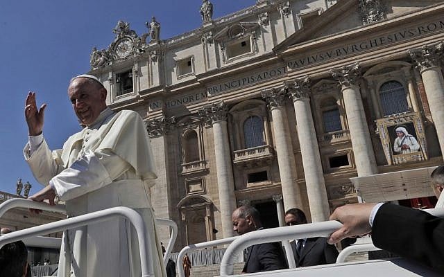 Pope Francis leaves St. Peter's Square at the Vatican at the end of a jubilee audience for workers and volunteers of mercy, September 3, 2016. (AP Photo/Alessandra Tarantino)