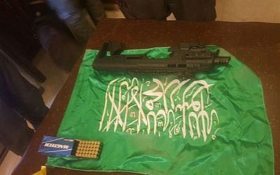A carbine conversion kit for a Glock pistol and a box of bullets that were found by police officers in East Jerusalem during a late-night raid on September 21, 2016. (Israel Police)