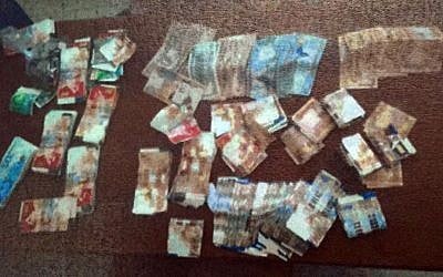 Approximately NIS 150,000 ($40,000) seized by the Shin Bet security during raids in Hebron and Yatir, under the suspicion that it had been earned through illegal gun sales in September 2016. (Shin Bet)