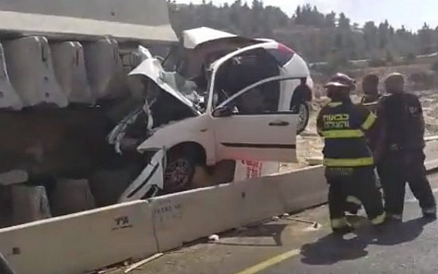 The scene of a car accident on Route 1 between Jerusalem and Tel Aviv, Saturday, September 17, 2016 (YouTube/Times of Israel Staff) The scene of a car accident on Route 1 between Jerusalem and Tel Aviv, Saturday, September 17, 2016 (YouTube/Times of Israel Staff)