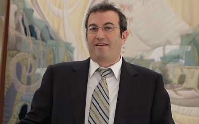 Ari Berman, a Yeshiva University graduate, is the choice to take over as president of his alma mater. (Screenshot from YouTube)