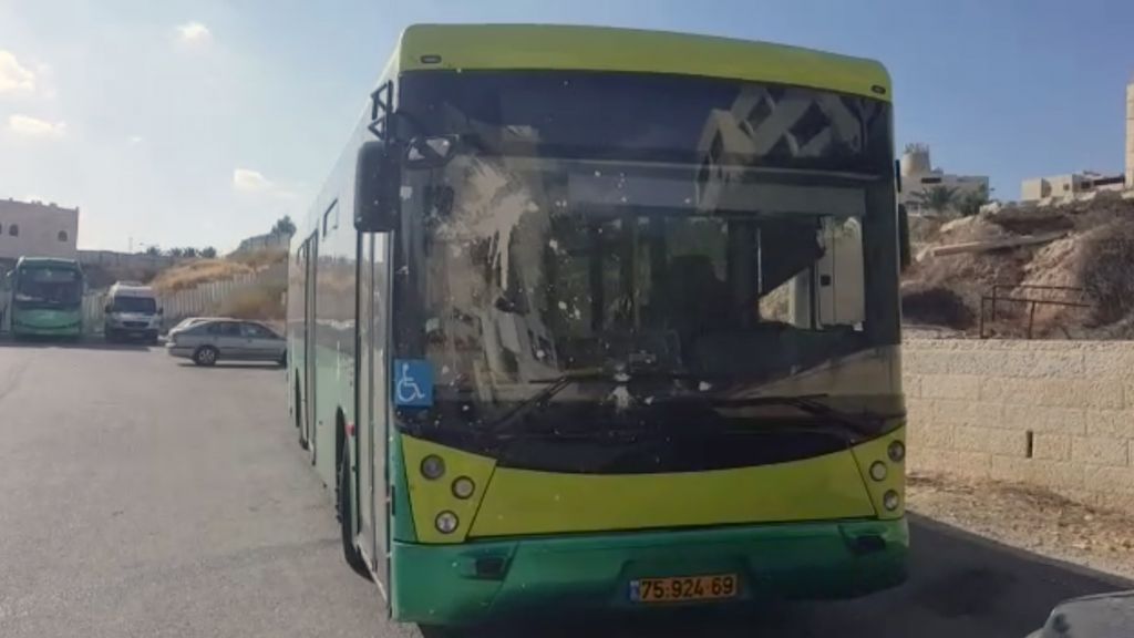 A bus that was struck by rocks and glass bottles full of paint as it traveled from Jerusalem to Ma'ale Adumim on September 16, 2016. (Screen capture: Israel Police) A bus that was struck by rocks and glass bottles full of paint as it traveled from Jerusalem to Ma'ale Adumim on September 16, 2016. (Screen capture: Israel Police)