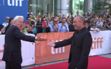 Actor Richard Gere introducing fans to filmmaker Joseph Cedar, who wrote and directed Gere's latest film, at the Toronto International Film Festival this past September. (Courtesy YouTube screen grab)