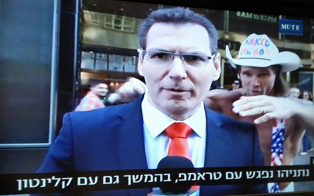 A screen capture of the Naked Cowboy touching an Israeli Channel 10 correspondent outside the Trump Tower in New York on September 25, 2016. (photo: Raoul Wootliff/Times of Israel)