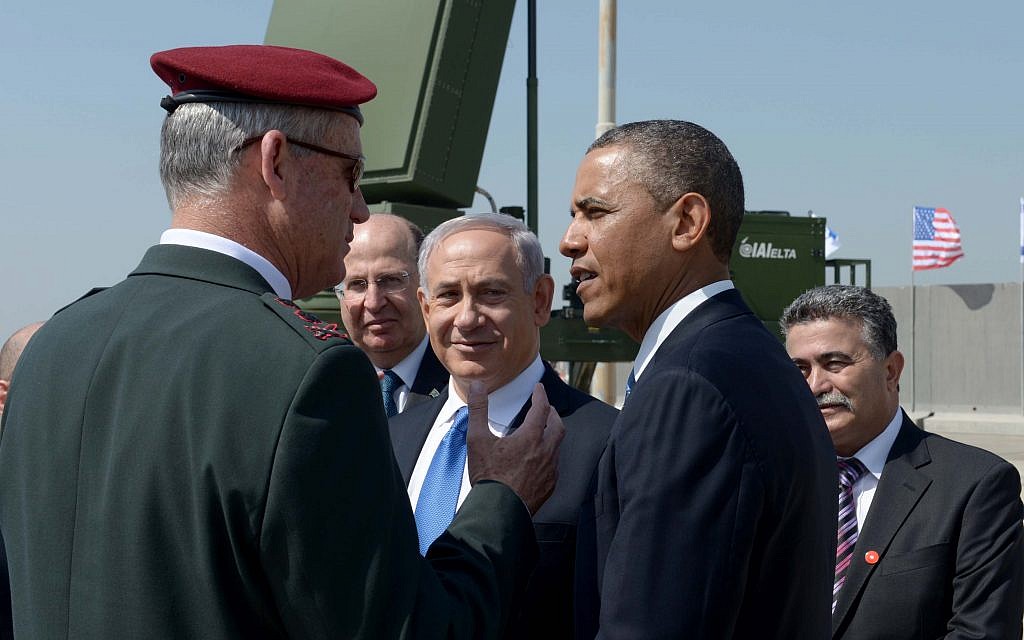 Then-US president Barack Obama, right, Then-IDF chief of staff Lt. Gen. Benny Gantz, left, then-defense minister Moshe Ya'alon and Prime Minister Benjamin Netanyahu against the backdrop of an Iron Dome anti-rocket battery, March 20, 2013. (Avi Ohayon/GPO/Flash90) Then-US president Barack Obama, right, Then-IDF chief of staff Lt. Gen. Benny Gantz, left, then-defense minister Moshe Ya'alon and Prime Minister Benjamin Netanyahu against the backdrop of an Iron Dome anti-rocket battery, March 20, 2013. (Avi Ohayon/GPO/Flash90)