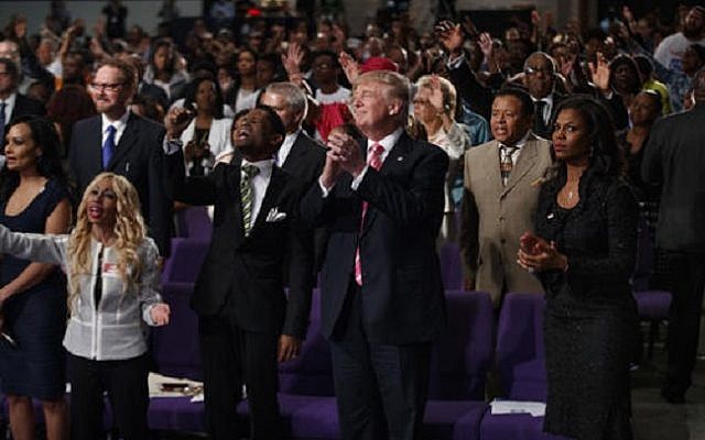 Republican presidential nominee Donald Trump isshown during a church service at Great Faith Ministries, Saturday, Sept. 3, 2016, in Detroit. (AP Photo/Evan Vucci) Republican presidential nominee Donald Trump isshown during a church service at Great Faith Ministries, Saturday, Sept. 3, 2016, in Detroit. (AP Photo/Evan Vucci)