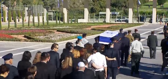 Shimon Peres's funeral procession leaves the Knesset, heads to Mount Herzl. September 30, 2016 (screen capture: livestream/GPO)