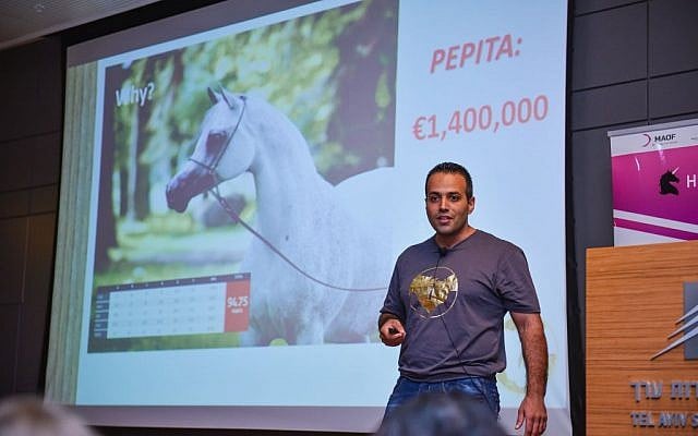 An entrepreneur from Horse Mate presents on his start-up project at the Hybid demo day in Tel Aviv on September, 22, 2016 (Courtesy) An entrepreneur from Horse Mate presents on his start-up project at the Hybid demo day in Tel Aviv on September, 22, 2016 (Courtesy)