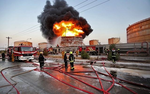 Iranian firefighters try to extinguish a blaze at the Bou Ali Sina Petrochemical Complex in southwestern Iran on July 4, 2016. (Borna Ghasemi/ISNA via AP) 
