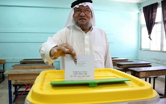 A Jordanian casts his vote in elections, Amman, Jordan, Tuesday, Sept. 20, 2016. (AP Photo/Raad Adayleh) A Jordanian casts his vote in elections, Amman, Jordan, Tuesday, Sept. 20, 2016. (AP Photo/Raad Adayleh)
