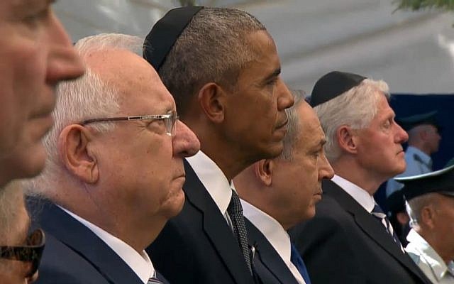 President Reuven Rivlin, US President Barack Obama, Prime Minister Benjamin Netanyahu and former US president Bill Clinton stand at Shimon Peres's funeral at Mount Herzl cemetery in Jerusalem on September 30, 2016. (screen capture: GPO livefeed) President Reuven Rivlin, US President Barack Obama, Prime Minister Benjamin Netanyahu and former US president Bill Clinton stand at Shimon Peres's funeral at Mount Herzl cemetery in Jerusalem on September 30, 2016. (screen capture: GPO livefeed)