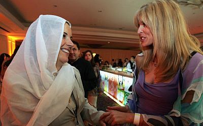Marla Maples, right, the ex-wife of Donald Trump, speaking with Dalila, the wife of Druze Sheikh Abu-Ruchon Hussein, at the Kabbalah international conference in Tel Aviv, Sept. 19, 2004. (Heidi Levine/Pool/Getty Images via JTA)