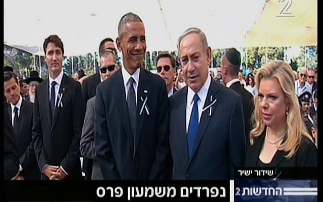 US President Barack Obama and Prime Minister Benjamin Netanyahu at Shimon Peres's funeral at Mount Herzl cemetery in Jerusalem on September 30, 2016. (screen capture: Channel 2)