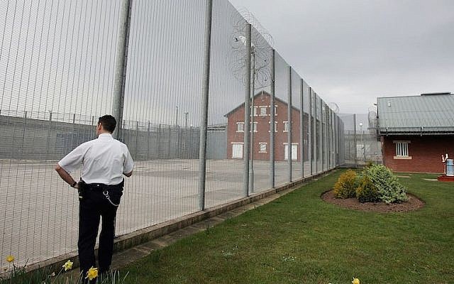 Illustrative: A prison guard of Premier Custodial Services patrols the security fencing of Kilmarnock Prison on 26 April, 2005, Kilmarnock, Scotland. (Christopher Furlong/Getty Images) Illustrative: A prison guard of Premier Custodial Services patrols the security fencing of Kilmarnock Prison on 26 April, 2005, Kilmarnock, Scotland. (Christopher Furlong/Getty Images)