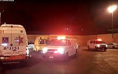 Ambulances and police cars near the Qalandia checkpoint on Friday evening, September 30, 2016. (Screen capture YouTube)