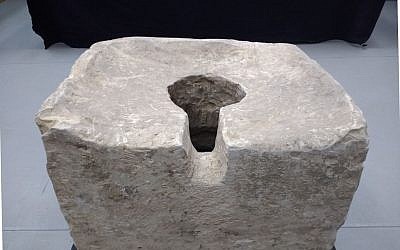 An 8th century BCE 'symbolic' toilet found at Lachish during the 2016 excavation by Israel Antiquities Authority archaeologists. (Ilan Ben Zion/Times of Israel staff)