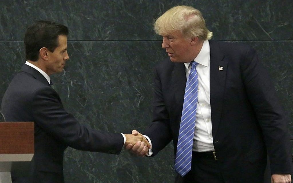 Mexican President Enrique Pena Nieto and then-Republican presidential nominee Donald Trump shake hands after a joint statement at Los Pinos, the presidential residence, Mexico City, Wednesday, August 31, 2016. (AP Photo/Marco Ugarte) Mexican President Enrique Pena Nieto and then-Republican presidential nominee Donald Trump shake hands after a joint statement at Los Pinos, the presidential residence, Mexico City, Wednesday, August 31, 2016. (AP Photo/Marco Ugarte)