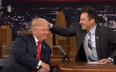 Donald Trump allows comedian Jimmy Fallon to play with his hair (YouTube screenshot)