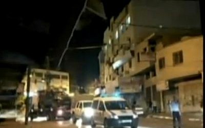 Police in Tulkarem rescuing two unarmed female Israeli soldiers who had mistakenly driven into the West Bank town using a navigation application. September 13, 2016, (Channel 2 Screenshot)