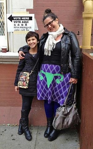 Marjorie Ingall in her uterus skirt on the way to the polling station with one of her daughters. (Courtesy)