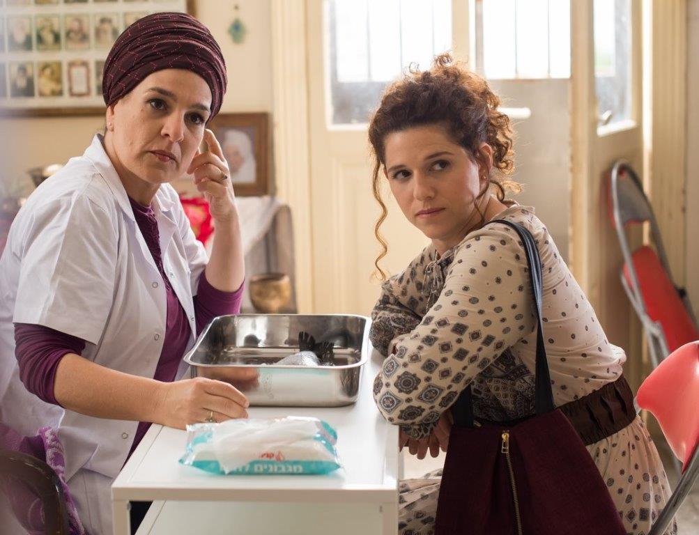 Actress Noa Koler (right) plays a single ultra-Orthodox woman who will do anything to get married in 'Through the Wall' (Courtesy Norma Productions)