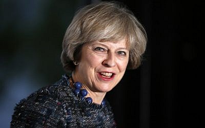 Britain's Prime Minister Theresa May arrives at a hotel close to the International Convention Center in Birmingham, central England, on October 1, 2016 on the eve of the start of the ruling Conservative party annual conference. (AFP PHOTO / Adrian DENNIS)