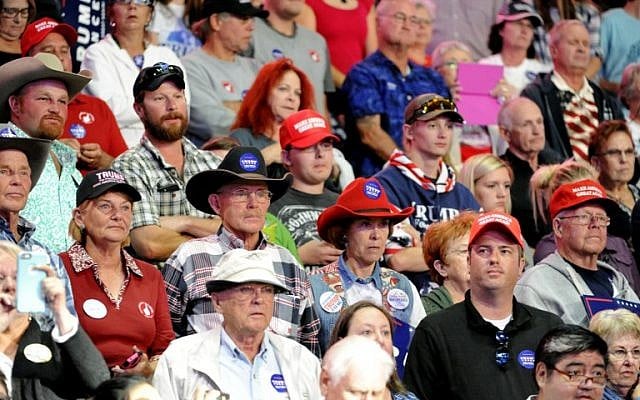 Supporters of Republican presidential nominee Donald Trump listen during his campaign stop at the Budweiser Events Center in Loveland, Colorado on October 3, 2016. (AFP PHOTO / Jason Connolly)