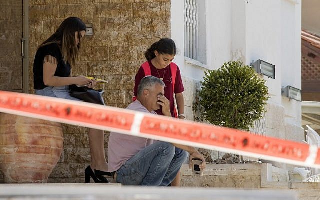 Israelis sit outside their home near the site where a rocket fired from the Gaza Strip hit in the southern Israeli town of Sderot, on October 5, 2016. (Jack Guez/AFP) Israelis sit outside their home near the site where a rocket fired from the Gaza Strip hit in the southern Israeli town of Sderot, on October 5, 2016. (Jack Guez/AFP)