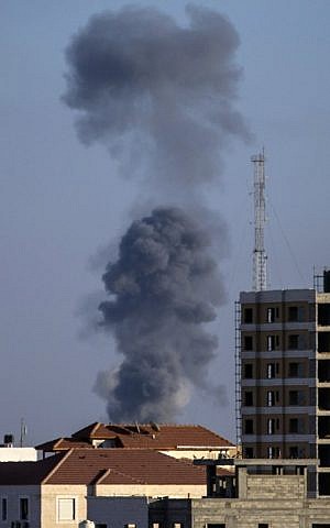 Smoke rises from east Gaza City after Israeli military struck a Hamas position in a reprisal attack in the Gaza Strip on October 5, 2016. (AFP/MAHMUD HAMS) Smoke rises from east Gaza City after Israeli military struck a Hamas position in a reprisal attack in the Gaza Strip on October 5, 2016. (AFP/MAHMUD HAMS)