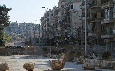 A picture shows destruction as Syrian pro-government forces advance in Aleppo's Bustan al-Basha neighborhood on October 6, 2016. (AFP PHOTO)