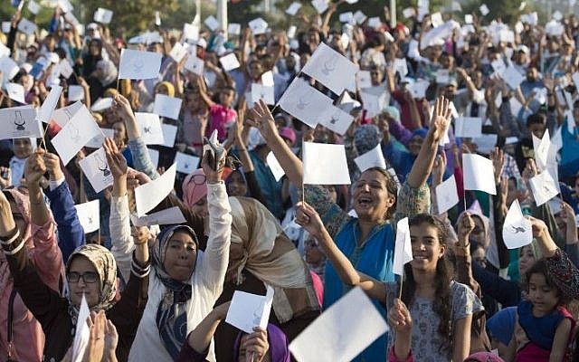 Supporters of the ruling Islamist Justice and Development Party (PJD) gather during a party meeting in Sale on October 6, 2016 ahead of the parliamentary election. (AFP/Fadel Senna)