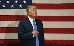 Republican presidential candidate Donald Trump listens to a question at a town hall event in Sandown, New Hampshire on October 6, 2016. (AFP/Mary Schwalm)