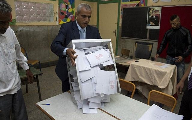 Moroccan election officials empty a ballot box during the country's parliamentary election in the capital Rabat on October 7, 2016. (AFP/Fadel Senna) Moroccan election officials empty a ballot box during the country's parliamentary election in the capital Rabat on October 7, 2016. (AFP/Fadel Senna)