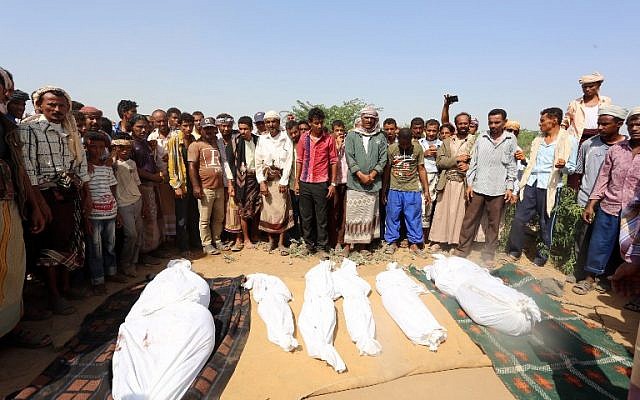 Yemenis attend the funeral of members of the same family on October 8, 2016 a day after they were killed in a reported airstrike by Saudi-led coalition air-planes that hit their house in Bajil in the western province of Houdieda. (AFP PHOTO / STRINGER) Yemenis attend the funeral of members of the same family on October 8, 2016 a day after they were killed in a reported airstrike by Saudi-led coalition air-planes that hit their house in Bajil in the western province of Houdieda. (AFP PHOTO / STRINGER)