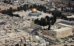 An aerial view of the Dome of the Rock, left, in the compound known to Muslims as al-Haram al-Sharif and to Jews as Temple Mount, in Jerusalem's Old City, and the Western Wall, center, the holiest site where Jews are permitted to pray (File photo: AFP/JACK GUEZ)