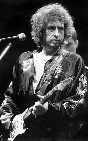 This file photo taken on July 29, 1981 shows US singer Bob Dylan performing during a concert in Munich, southern Germany. (AFP PHOTO / DPA / Frank Leonhardt)