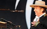 US poet and folk singer Bob Dylan performing during the 21st edition of the Vieilles Charrues music festivalin Carhaix-Plouguer, western France,  July 22, 2012. (AFP/Fred Tanneau)