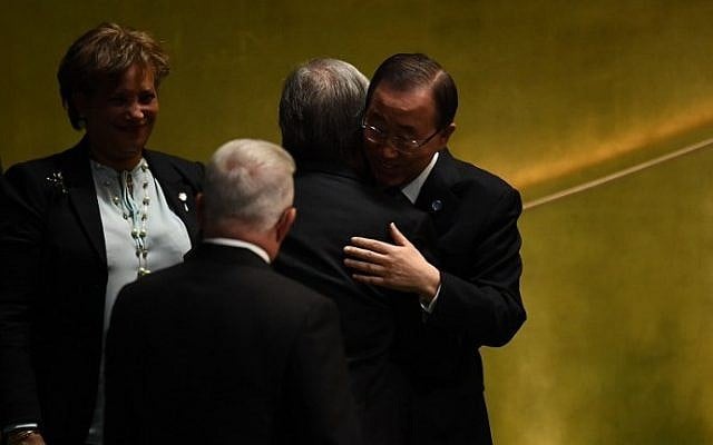 Outgoing UN Secretary General Ban Ki-moon hugs Secretary-General-designate Antonio Guterres during the ceremony for the appointment of the Secretary-General during the 70th session of the General Assembly October 13, 2016 at the United Nations in New York. (AFP PHOTO / Jewel SAMAD)