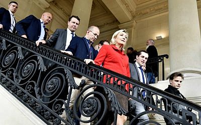 French far-right leader Marine Le Pen, center, at the Salon Planete PME, a forum for French small and medium businesses, on October 18, 2016, in Paris. (Alain Jocard/AFP)