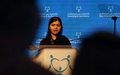 Pakistani activist for female education and Nobel Peace Prize laureate, Malala Yousafzai, delivers a speech during a conference entitled "Investing in The Future: Building the resilience of women and girls in the Arab region on October 19, 2016, in the United Arab Emirate of Sharjah. (AFP PHOTO / KARIM SAHIB)