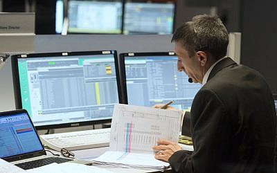 Michel Denis, French ExoMars Flight Director, works in the main control room of the European Space Agency (ESA) prior to the expected landing of the decent modul Schiaparelli of European-Russian ExoMars 2016 mission at the ESA space operation center (ESOC) in Darmstadt, Germany, on October 19, 2016. (AFP PHOTO / THOMAS KIENZLE)