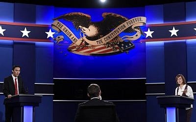 Stand-ins check audio and lighting for the third and final presidential debate between Democratic presidential candidate Hillary Clinton and Republican presidential candidate Donald Trump at the Thomas & Mack Center on the campus of the University of Nevada, Las Vegas in Las Vegas, Nevada, October 19, 2016. (AFP PHOTO / SAUL LOEB)