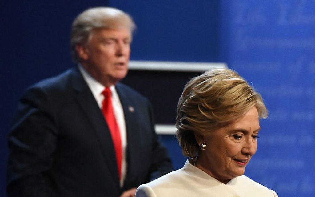 Democratic nominee Hillary Clinton, right, and Republican nominee Donald Trump walk off the stage after the final presidential debate at the Thomas & Mack Center on the campus of the University of Nevada, Las Vegas in Las Vegas, Nevada on October 19, 2016. (Robyn Beck/AFP) Democratic nominee Hillary Clinton, right, and Republican nominee Donald Trump walk off the stage after the final presidential debate at the Thomas & Mack Center on the campus of the University of Nevada, Las Vegas in Las Vegas, Nevada on October 19, 2016. (Robyn Beck/AFP)