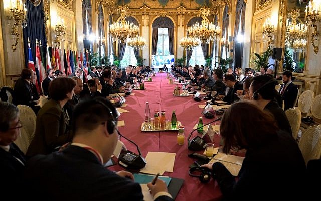 General view of delegates attending an international meeting co-hosted by France and Iraq on the future of Mosul following the start of the offensive this week, on October 20, 2016 at the French Foreign ministry in Paris.( AFP PHOTO / POOL / ERIC FEFERBERG)