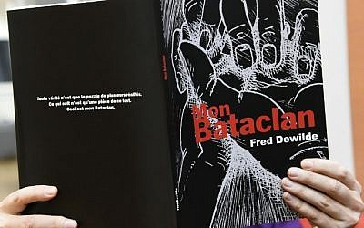 A woman reads the comic book "Mon Bataclan" in Paris on October 20, 2016. (Bertrand Guay/AFP) A woman reads the comic book "Mon Bataclan" in Paris on October 20, 2016. (Bertrand Guay/AFP)