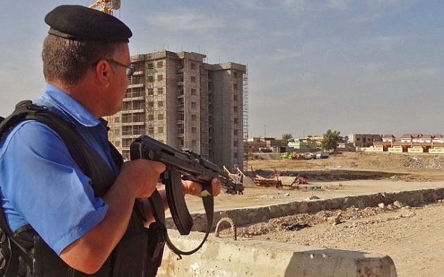 A member of the Iraqi police stands guard as security forces deploy in the southern Domiz neighborhood of Kirkuk on October 21, 2016, after jihadist gunmen attacked the city. (AFP/Marwan Ibrahim) A member of the Iraqi police stands guard as security forces deploy in the southern Domiz neighborhood of Kirkuk on October 21, 2016, after jihadist gunmen attacked the city. (AFP/Marwan Ibrahim)